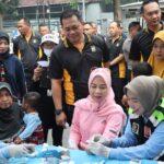 Polres Nganjuk Gelar Bakti Sosial Car Free Day, Wujud Nyata Pelayanan Publik di HUT Bhayangkara ke-79